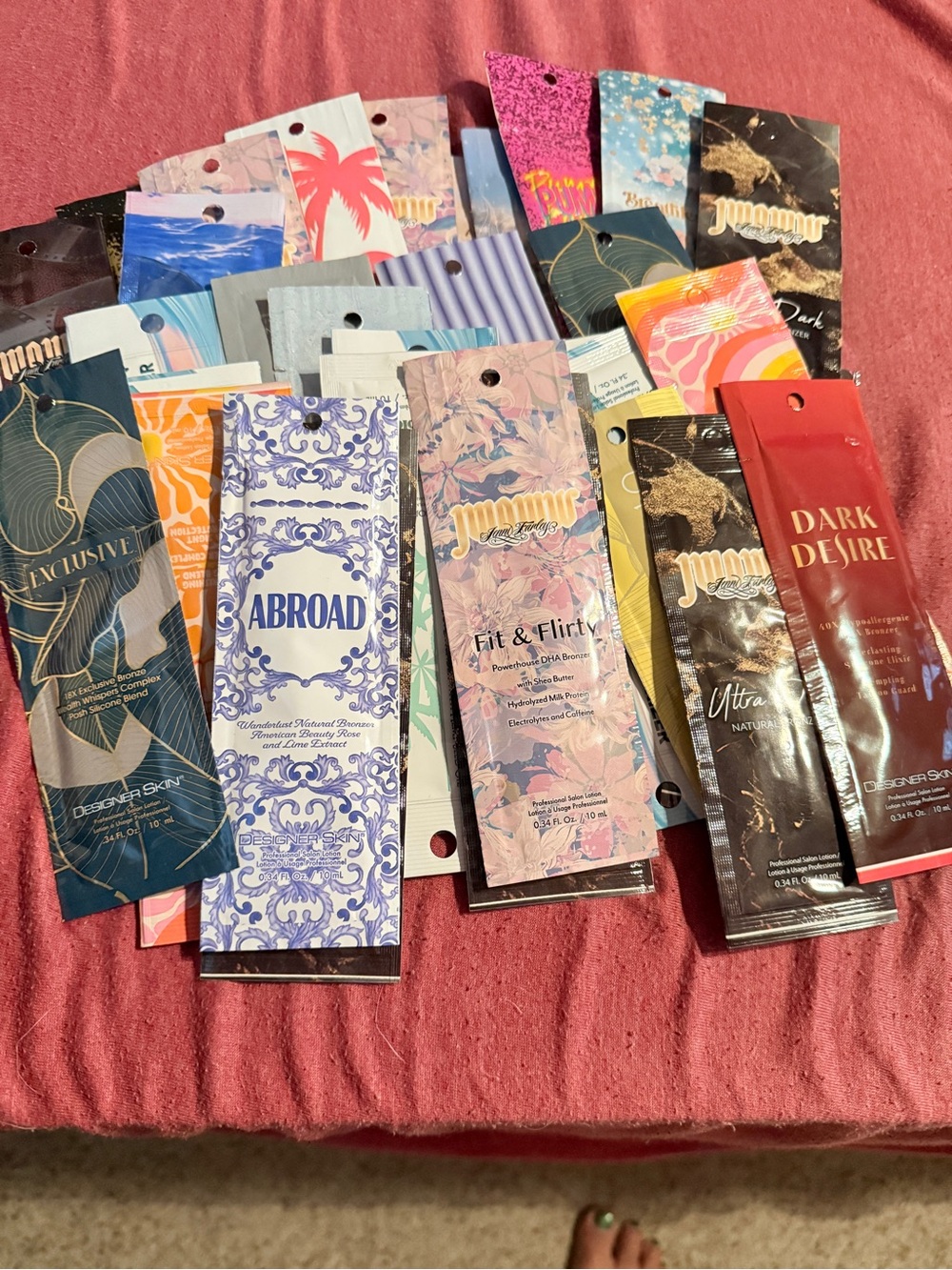 Assorted Designer Skin Tanning Lotion Packets - Mixed Colors